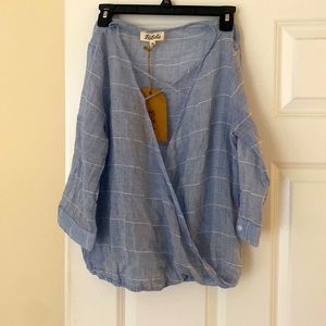 Never worn/ tags still on light blue criss cross top